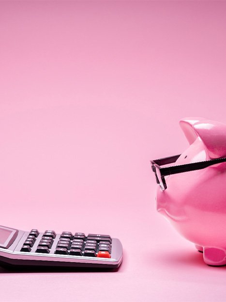 Piggy bank and calculator.