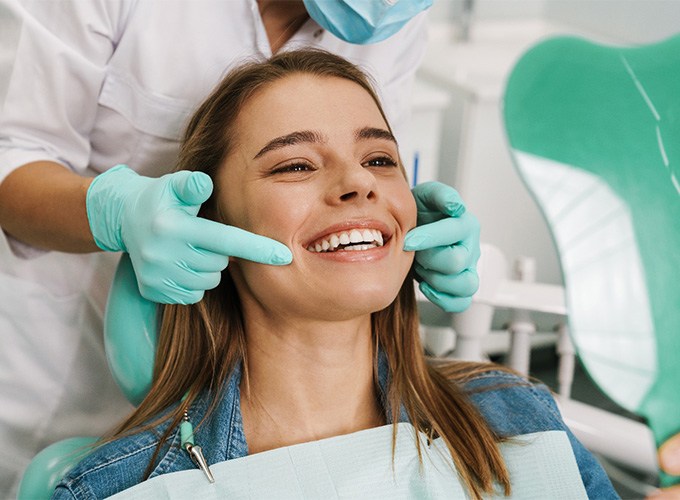 Woman smiling at the dentist.