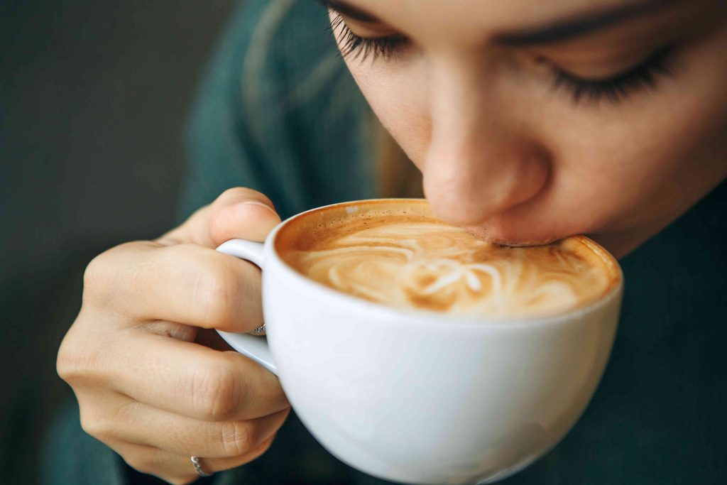 Woman drinking a cup of coffee